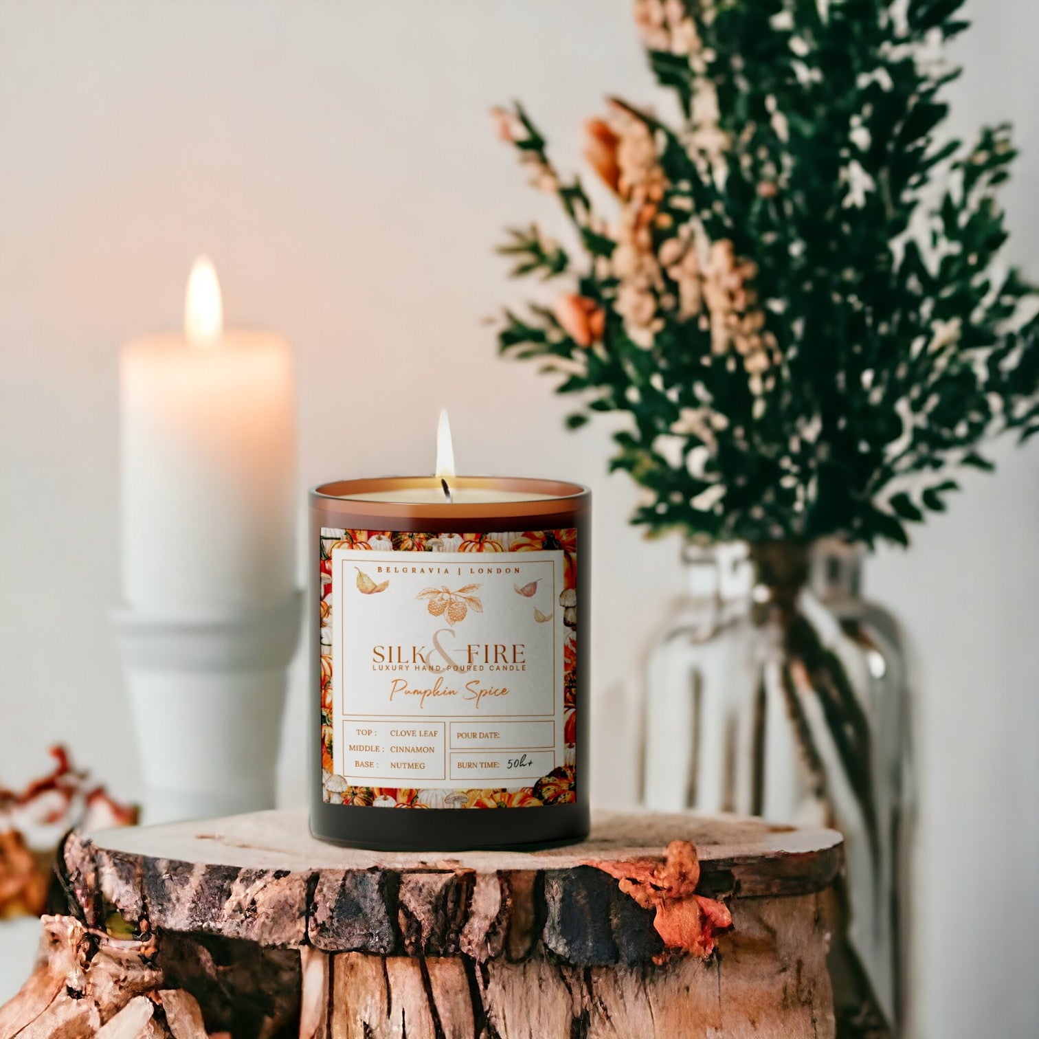 Autumn living room scene with a single amber glass candle glowing on a low shelf